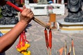 People burning incense and red candle for pray god Royalty Free Stock Photo