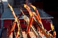 People burning incense and red candle for pray god Royalty Free Stock Photo