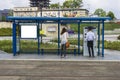 People on Bus stop Royalty Free Stock Photo