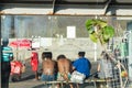 People at the bus stop waiting for transport home after the day at Farol da Barra beach. Salvador, Bahia, Brazil Royalty Free Stock Photo