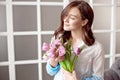 People, business, sale and floristry concept - close-up of florist woman holding bunch at flower shop. Royalty Free Stock Photo