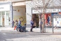 People busy shopping and some street entertainers in Dundee City Centre Scotland Royalty Free Stock Photo