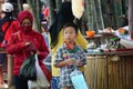 People buy food on Pasar ndeso Sor Preng Mojo. Pasar ndeso means a traditional market that sells Indonesian traditional snacks and