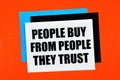 People buy from people they trust. The inscription on the sticker. Royalty Free Stock Photo