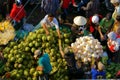 People buy and sell coconut at market.DA LAT, VIET NAM- FEBRUARY 8, 2013 Royalty Free Stock Photo