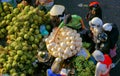 People buy and sell coconut at market.DA LAT, VIET NAM- FEBRUARY 8, 2013 Royalty Free Stock Photo