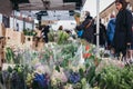 People buying flowers at Columbia Road Flower Market, London, UK Royalty Free Stock Photo