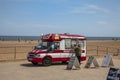 People buying ice-cream from a Mr. Whippy van in Skegness