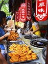 People Buying Persimmon Cakes at China Xi`an Muslim Food Street