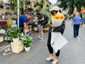 People buying plants at the Columbia road flower market London , Uk Royalty Free Stock Photo