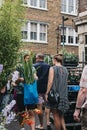 People buying plants and flowers at the Columbia Road Flower Market, London, UK. Royalty Free Stock Photo