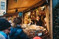 People buying pretzels on sale at Christmas and New Year`s Market at Schonbrunn Palace, Vienna, Austria.