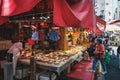 People buying and selling fish on seafood food market in HongKong