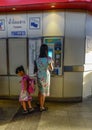 People buying train ticket for public transport Royalty Free Stock Photo