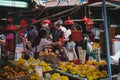 People buying vegetables and fruits on street food market in HongKong