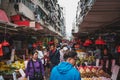 People buying vegetables and fruits on street food market in HongKong