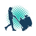 Silhouette of a female worker pushing lori wheels transporting sacks Royalty Free Stock Photo
