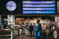 People at a cafe, waiting for their trains under the dep Royalty Free Stock Photo