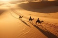 People on camels move through the desert. Beautiful desert landscape, top view