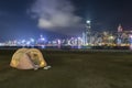 Seaside promenade of Victoria harbor in Hong Kong city at night