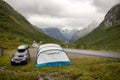 People, camping wild in Norway in high mountains, snow, cold, fog at night Royalty Free Stock Photo