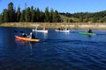 People Canoeing On The Snake River, Grand Teton National Park, Wyoming.