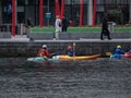 People in canoes, rowing, Grand Canal Dock, Dublin