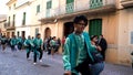People with carnival costumes on the street during the famous Carnival of Cadiz, Andalusia, Spain. Art. Men and women in Royalty Free Stock Photo