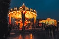 MOSCOW,RUSSIA- JANUARY 2017:People on carousel near Red Square decorated and arranged for Christmas New Year. Luminous roundabout