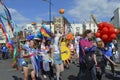 People carrying flags and banners in the colourful Margate Gay pride Parade Royalty Free Stock Photo