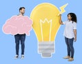 People carrying a light bulb and a brain icons Royalty Free Stock Photo