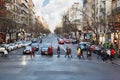 People and cars go at street