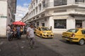 People and cars on street in Popayan , Colombia