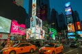 People and cars at Times Square at night . Royalty Free Stock Photo