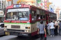 People catching a bus in Chinatown, Bangkok, Thailand