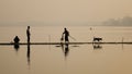 People catching fish on lake in Mandalay, Myanmar