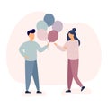 People celebrating birthday, man gives woman balloons Royalty Free Stock Photo