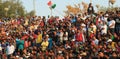 People celebrating at the border flag lowering ceremony