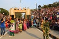 People celebrating at the border flag lowering ceremony