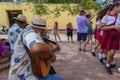 People celebrating in a Park to Live Street Music, Trinidad, Cuba