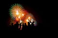 People and the celebration of happiness Colorful fireworks burst into the night sky. Royalty Free Stock Photo