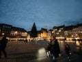 People in central Place Kleber with CHristmas Tree in background