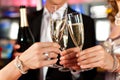 People with champagner in a bar Royalty Free Stock Photo