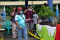 People checking and scoring bonsai on bonsai festival in Kediri