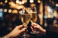 People cheers with champagne glasses at party. Christmas friends celebration
