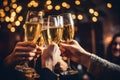 People cheers with champagne glasses at party. Christmas friends celebration