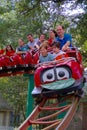 People-Children and Adults on a Amusement Park Roller Coaster Royalty Free Stock Photo