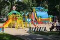 People with children on playground in Ivan Franko park. Lviv, Uk Royalty Free Stock Photo
