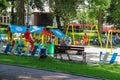 People with children on playground in Ivan Franko park. Lviv, Royalty Free Stock Photo