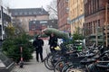 People christmas shoppers at tree vendor in Copenhagen